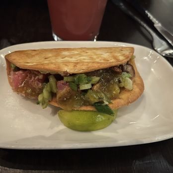 Barrio signature dishes Chicken EnchiladasMahi Mahi TacoBurritos